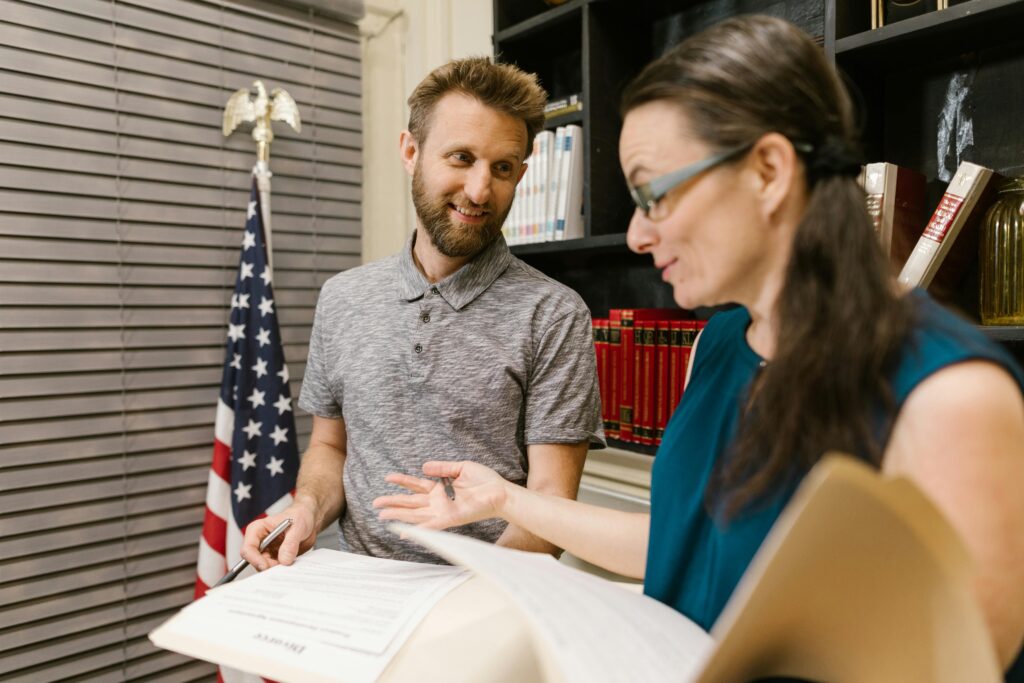 Team collaboration at The Fair Report office — representing our About Us mission to simplify legislation